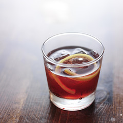 sazerac cocktail on wooden bar table top