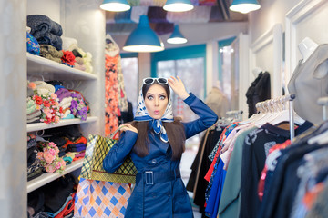 Curious Girl in Blue Trench Coat and Sunglasses Shopping 