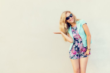 Beautiful girl in fashionable clothes.