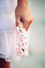 Holding flowers on a girl's hands