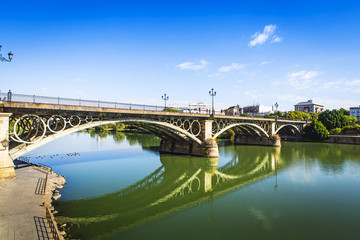 Fototapeta na wymiar Triana Bridge in Seville City. Andalusia, Spain.