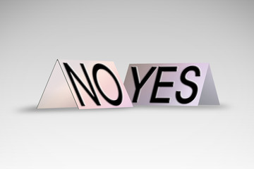 Yes and No written on colored cardboard - concept image