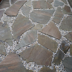 Making the garden path with natural stone.