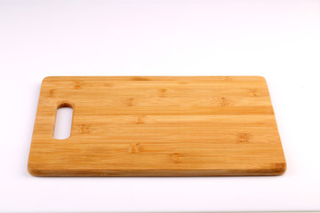 Wooden chopping block isolated with white background