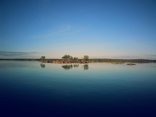 Island in horizon. Lapland Finland.
