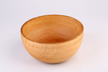 Wooden bowl isolated on white background