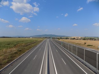 Highway between fields