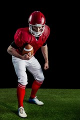 Portrait of focused american football player