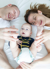 Happy parents and child