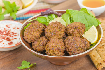 Falafel - Middle Eastern deep fried balls made of chickpeas.

