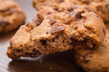 broken-off piece of chocolate chip cookies closeup