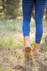 Close up view of woman hiking on path