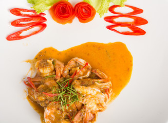 Curry fried shrimps and cooked rice