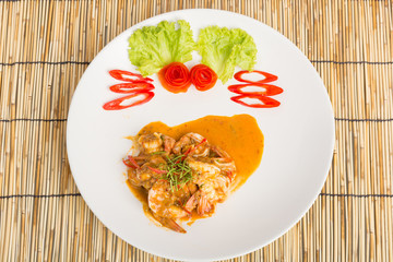 Curry fried shrimps and cooked rice