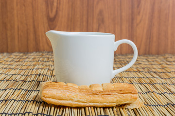 Breakfast pitcher of milk and bread