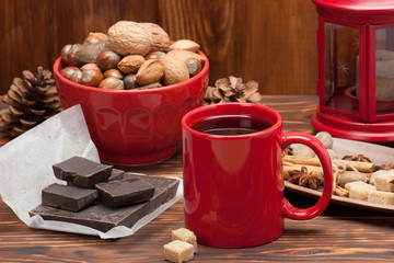Mug Of Tea Or Coffee. Sweets And Spices. Bowl Of Nuts. Christmas