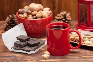 Mug Of Tea Or Coffee. Sweets And Spices. Bowl Of Nuts. Christmas