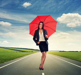 smiley woman with red umbrella