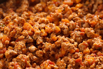 Fried meat with corn on pita bread.