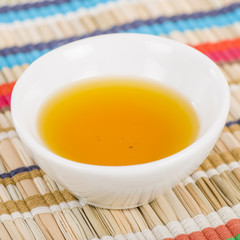 Chilli Olive Oil - Chilli flavoured extra virgin olive oil on a colourful background.
