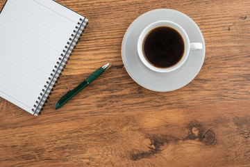Notebook with pen and cup of  coffee, Planning