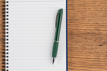 Lined notebook and pen, checklist  memo reminder memorandum