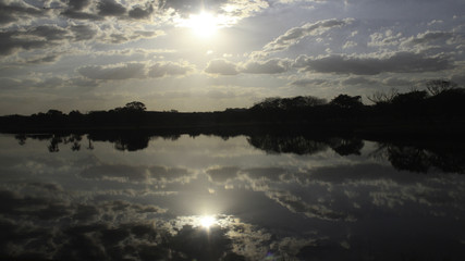 Fototapeta na wymiar Sun reflex in lake