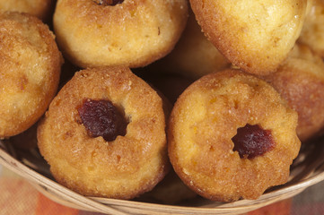 Cakes with jam in a basket