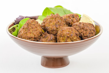 Falafel - Middle Eastern deep fried balls made of chickpeas.
