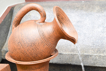 Water flows from a jug