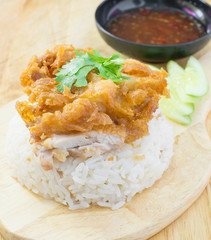 fried chicken served on rice