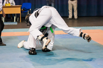 The boys compete in the Kobudo