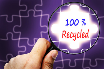 recycled word. Magnifier and puzzles.