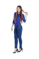 Portrait of a beautiful woman in blue jeans and blue shirt