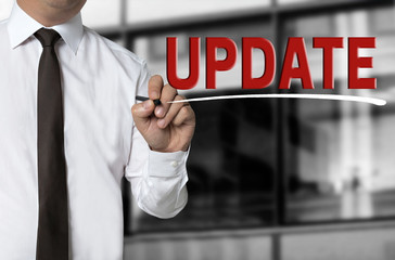 update is written by businessman background concept