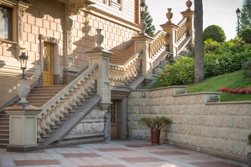 Deurstickers beautiful staircase made of stone in a wealthy house © dvoinik