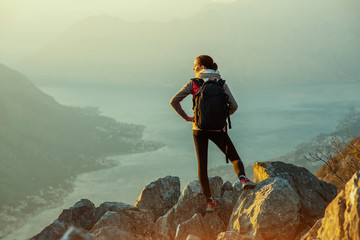 Young photographer on the top of mountain