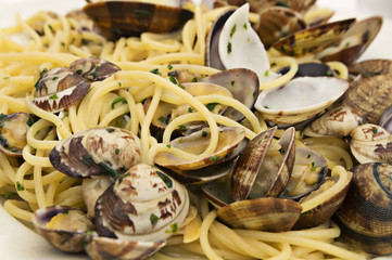 Italian food. Delicious spaghetti with clams .