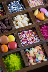 close view on sugar decoration in wooden box