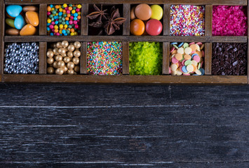 Vintage box with vibrat sugar decorations