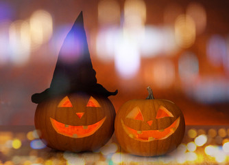 close up of carved halloween pumpkins on table