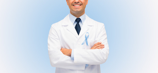happy doctor with prostate cancer awareness ribbon