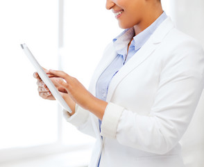 businesswoman with tablet pc in office