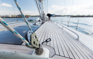 close up of sailboat deck or yacht sailing on sea