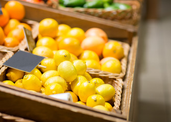 ripe lemons at food market