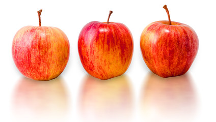 Three fresh red apples isolated on white background.