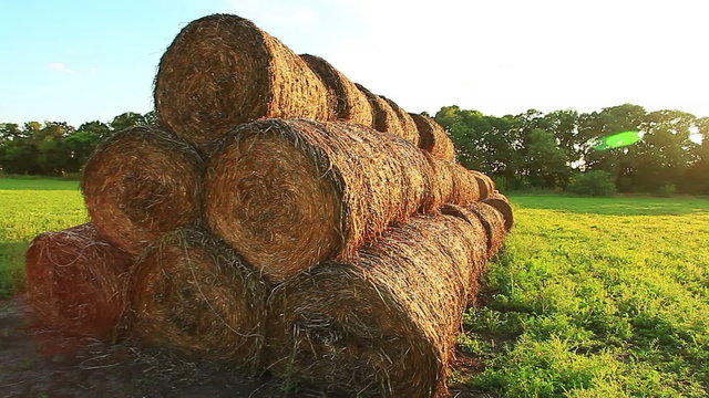 old hay field at susnset in summer fly video