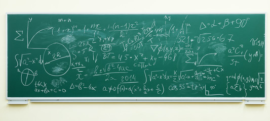 math formulas on green chalkboard