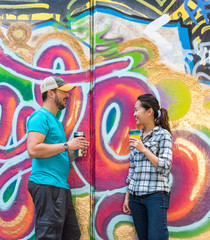 Obraz na płótnie Canvas Couple Chatting in Skatepark