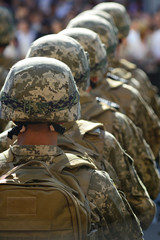 rows of soldiers in helmets